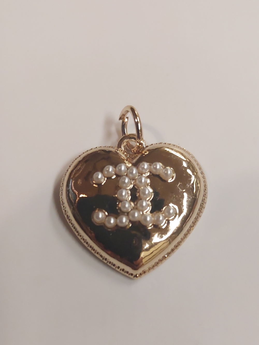 Gold Heart Pendant with Pearl Logo Accent